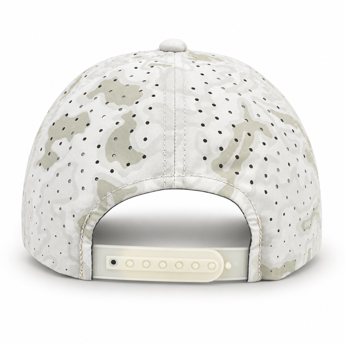 The back view of a baseball cap featuring a light beige and white camouflage pattern with perforated holes, a white snapback closure, and a white button on top.