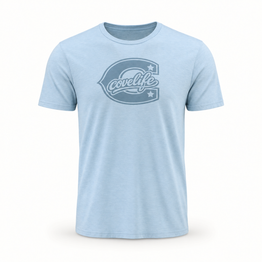 A light blue heather crewneck t-shirt featuring a dark blue graphic on the chest with the word 'covlife' inside a stylized letter 'C' outlined with stars.