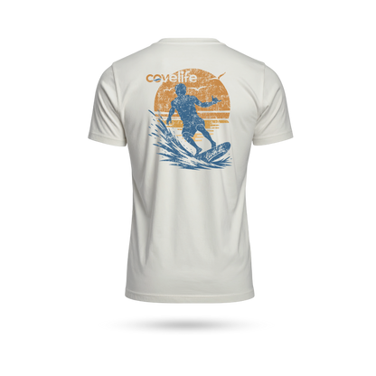 A short-sleeve crewneck t-shirt shown from the back, featuring a distressed graphic print of a surfer riding a wave in blue and orange, with the brand name 'covelife' printed above.