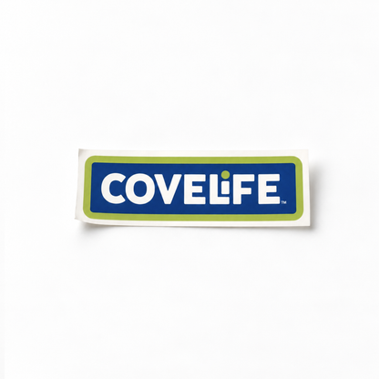 A rectangular sticker featuring the brand name 'COVELIFE' in white text on a dark blue background, bordered by a light green rounded rectangle, shown on a plain white background.