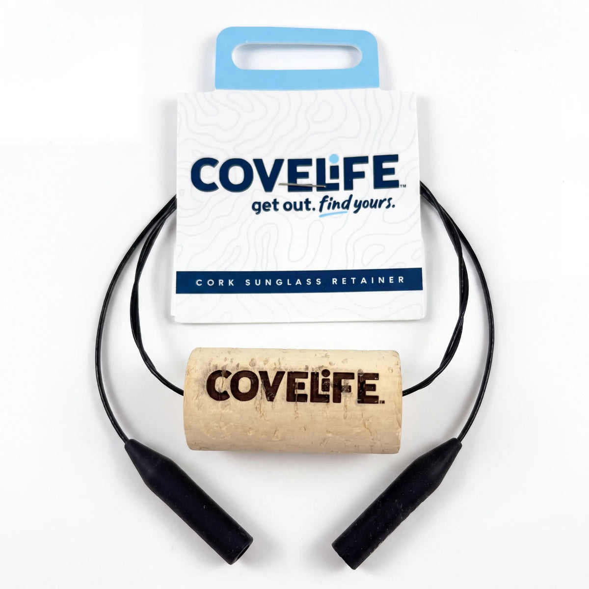 Cork sunglasses retainer with black cable cords and a natural cork center printed with the COVELIFE logo, displayed in front of its white and blue retail packaging card on a white background.