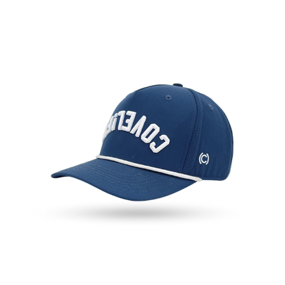 A navy blue baseball cap with white embroidered lettering on the front and a white piping detail along the brim, shown against a plain white background.