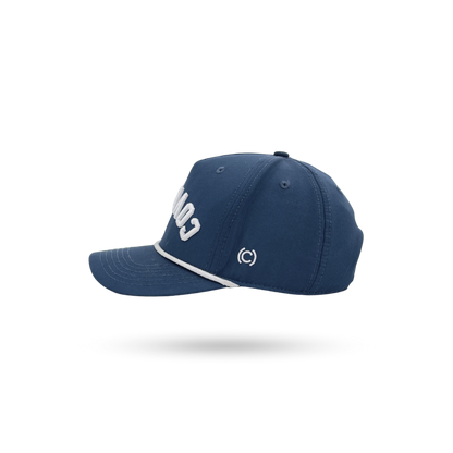 A navy blue baseball cap with white embroidered lettering on the front and a white piping detail along the edge of the brim, shown against a plain white background.
