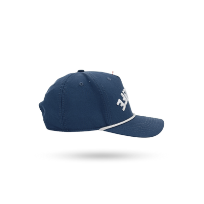 A navy blue baseball cap with a white embroidered logo on the side, shown from a three-quarters angle against a plain white background.