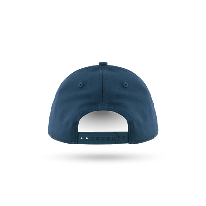 The back view of a navy blue baseball cap with a snapback closure, shown on a clean white background with a soft shadow underneath.