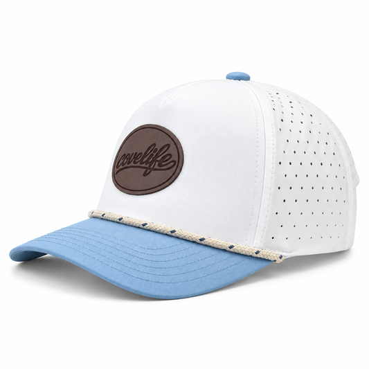 DRiFTFiT Perforated Performance Cap in White and Sky Blue with Midnight Leather Patch 3/4 angle view.
