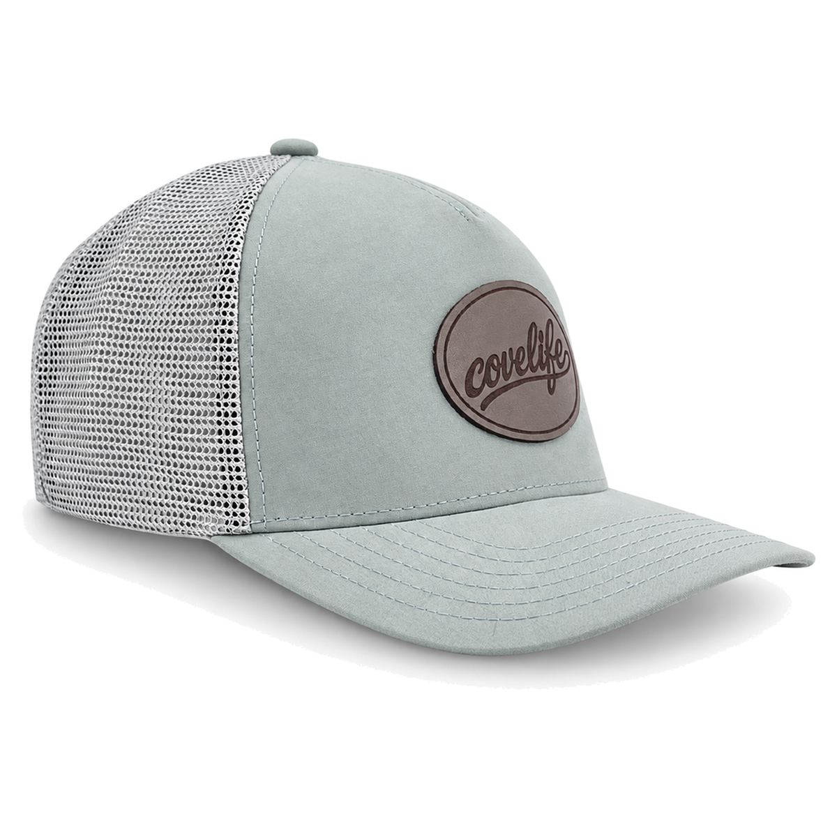 A sage green CLASSIC MESH  hat with a curved brim, featuring a light green front panel, a darker green mesh back, and a brown oval patch on the front with the brand name 'covelife' in script.